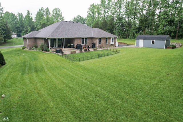 845 S Bay, North Vernon, IN 47265 - rear view of property with a patio area, brick siding, and roof with shingles