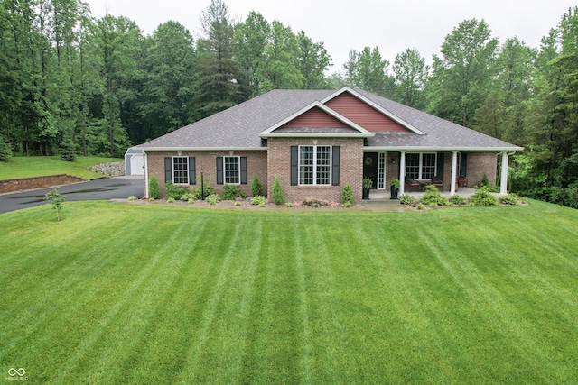 845 S Bay, North Vernon, IN 47265 - single story home featuring a porch, an outbuilding, brick siding, and a shingled roof
