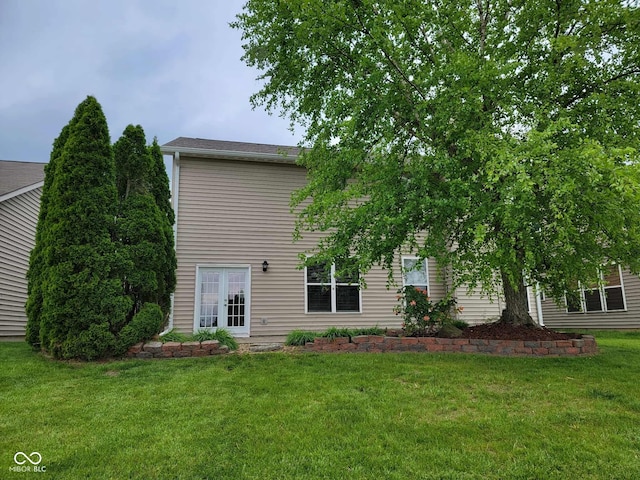 11070 Long Lake Ln, Fishers, IN 46037 - rear view of house with a lawn and french doors