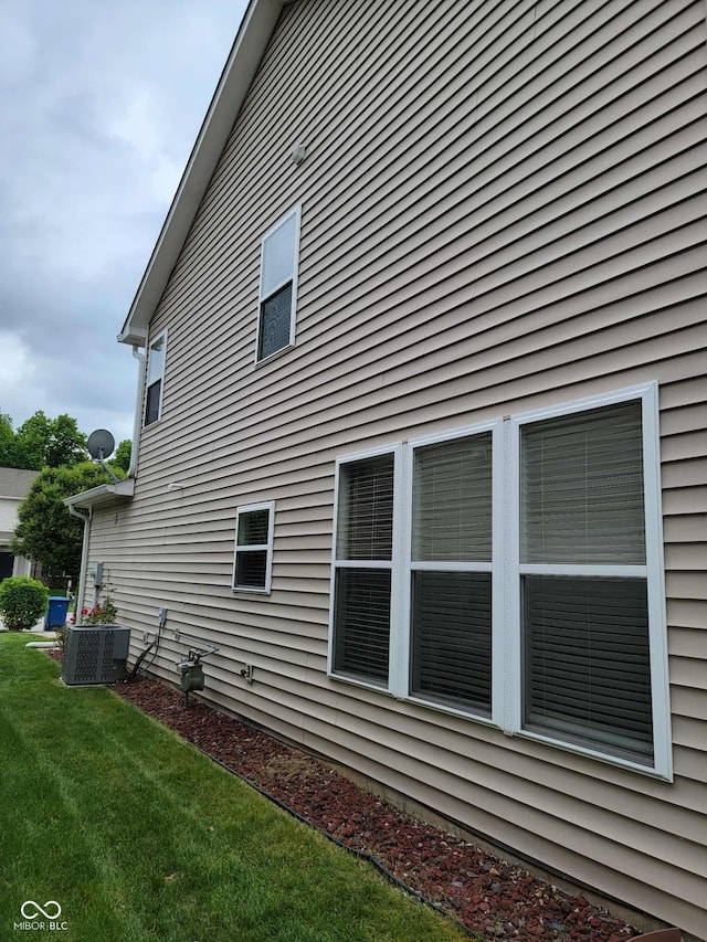 11070 Long Lake Ln, Fishers, IN 46037 - view of home's exterior with central air condition unit and a lawn