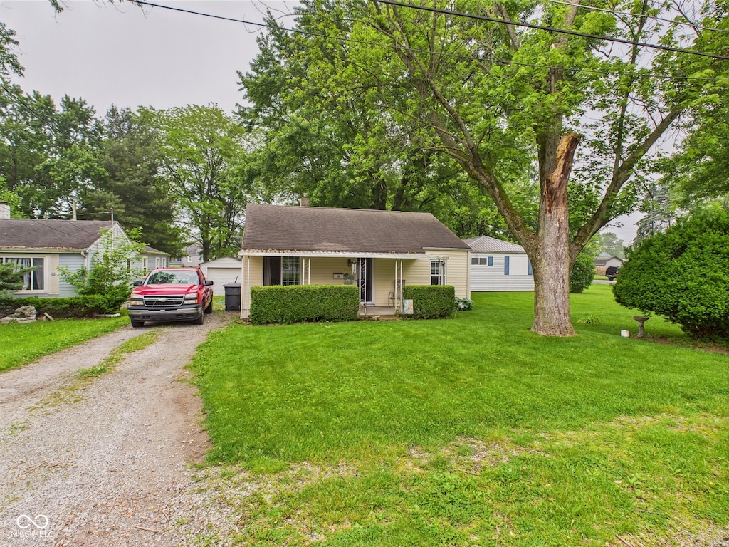2405 E 9th St, Anderson, IN 46012 - view of front of home with a front lawn