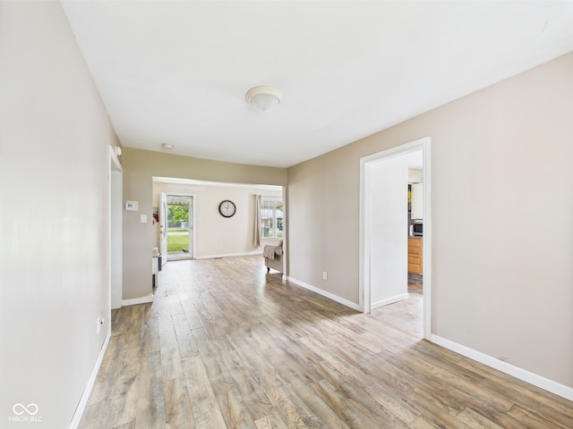 2405 E 9th St, Anderson, IN 46012 - unfurnished room with wood finished floors and baseboards