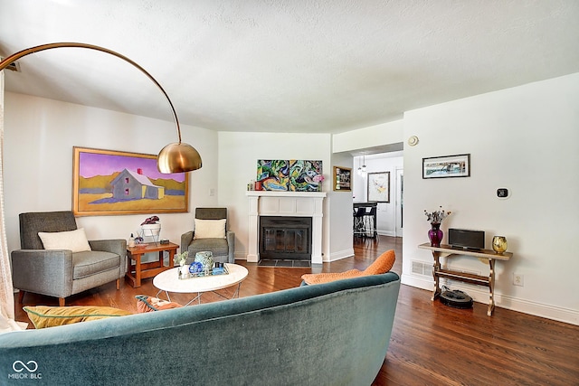 1548 N Park Ave, Indianapolis, IN 46202 - living room with a fireplace with flush hearth, wood finished floors, and baseboards