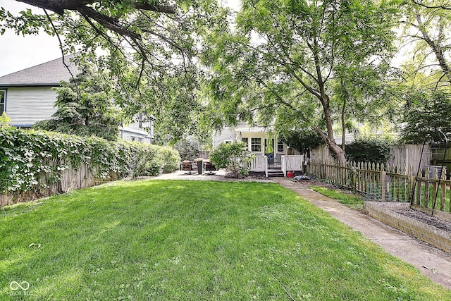1548 N Park Ave, Indianapolis, IN 46202 - view of yard featuring a deck