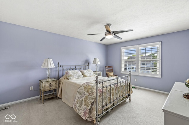 11244 Blackwalnut Pt, Indianapolis, IN 46236 - carpeted bedroom with a ceiling fan and a textured ceiling