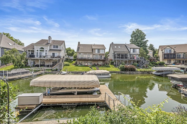 11244 Blackwalnut Pt, Indianapolis, IN 46236 - dock area with a residential view, a water view, stairs, and boat lift