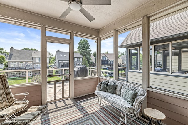 11244 Blackwalnut Pt, Indianapolis, IN 46236 - sunroom / solarium featuring a ceiling fan and a residential view