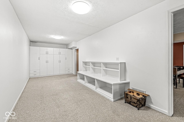 11244 Blackwalnut Pt, Indianapolis, IN 46236 - corridor featuring light colored carpet and a textured ceiling