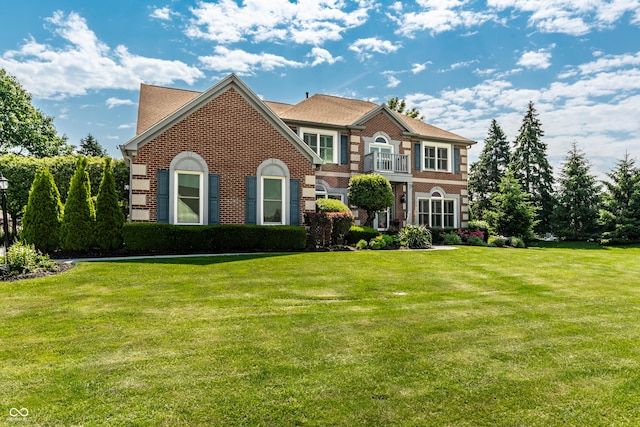 14149 Ledgewood Way, Carmel, IN 46032 - colonial house featuring brick siding and a front yard