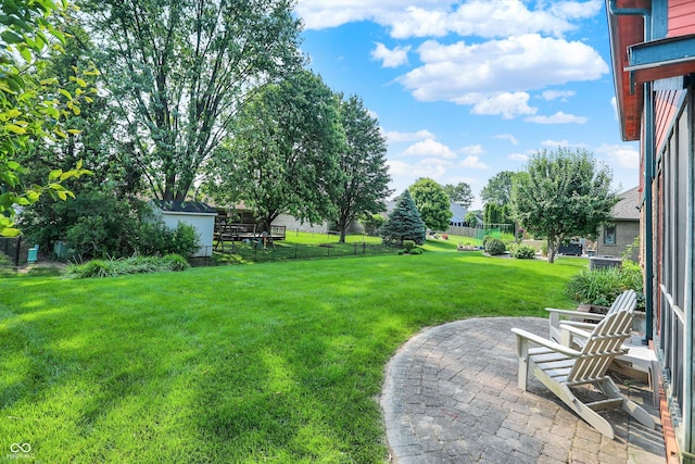 8619 Wrangler Ct, Indianapolis, IN 46217 - view of yard featuring a patio