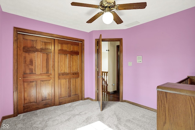 8619 Wrangler Ct, Indianapolis, IN 46217 - carpeted bedroom with baseboards and a ceiling fan