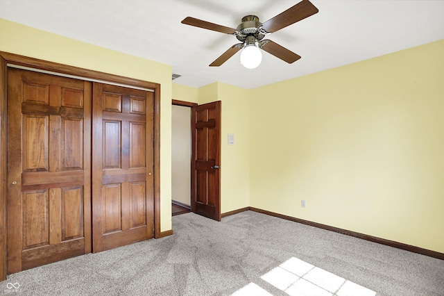 8619 Wrangler Ct, Indianapolis, IN 46217 - unfurnished bedroom featuring carpet floors, baseboards, and ceiling fan