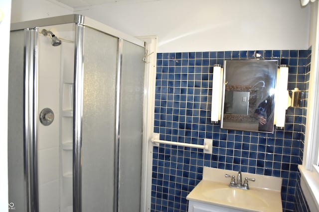 1641 Winton Ave, Speedway, IN 46224 - bathroom featuring tile walls, a stall shower, and vanity