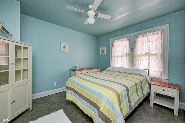 1641 Winton Ave, Speedway, IN 46224 - bedroom with dark colored carpet, baseboards, and a ceiling fan