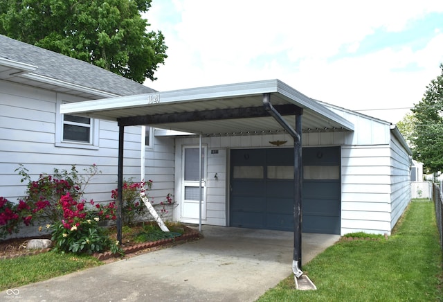 1641 Winton Ave, Speedway, IN 46224 - view of front facade featuring concrete driveway, a shingled roof, and a garage