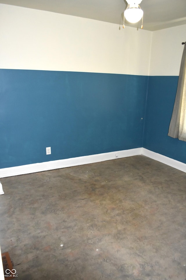1641 Winton Ave, Speedway, IN 46224 - spare room with concrete flooring and baseboards
