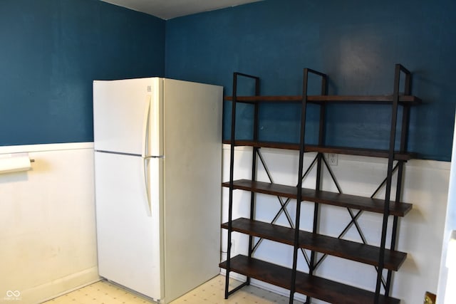 1641 Winton Ave, Speedway, IN 46224 - kitchen with freestanding refrigerator and tile patterned floors