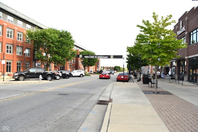 1641 Winton Ave, Speedway, IN 46224 - view of asphalt street featuring sidewalks, curbs, and street lighting