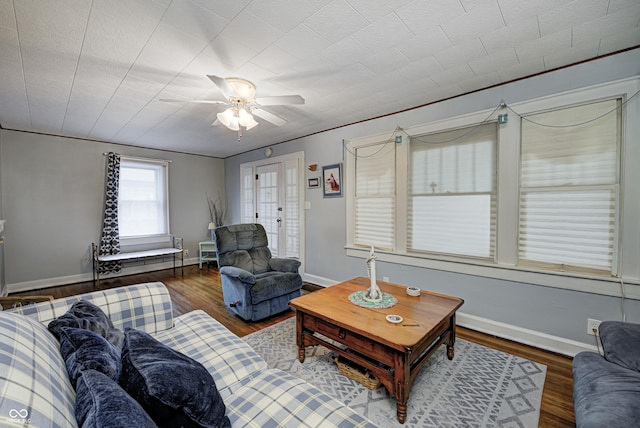 1641 Winton Ave, Speedway, IN 46224 - living area featuring a ceiling fan, wood finished floors, and baseboards