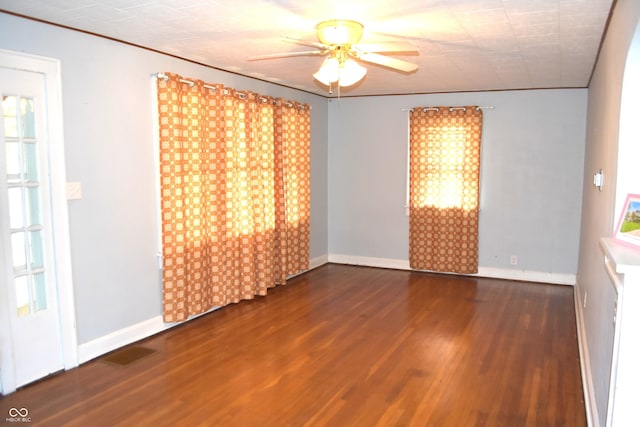 1641 Winton Ave, Speedway, IN 46224 - unfurnished room with wood finished floors, ceiling fan, baseboards, and ornamental molding