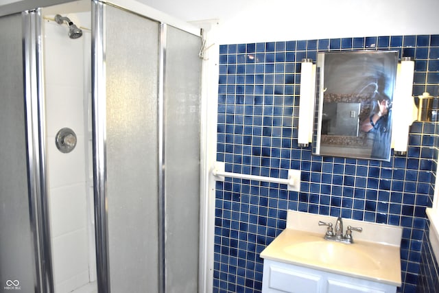 1641 Winton Ave, Speedway, IN 46224 - bathroom with a stall shower, vanity, and tile walls