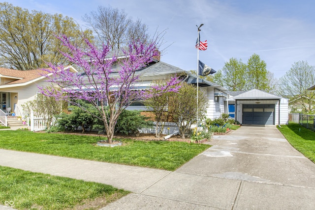 1641 Winton Ave, Speedway, IN 46224 - view of property hidden behind natural elements featuring an outbuilding and driveway