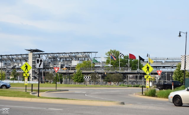 1641 Winton Ave, Speedway, IN 46224 - view of asphalt road featuring traffic signs and street lights