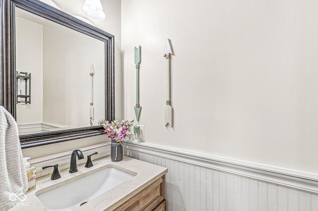 4642 Big Run Ct, Indianapolis, IN 46239 - bathroom featuring vanity and wainscoting