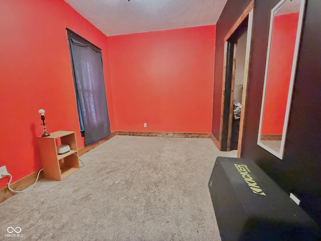 1126 S 20th St, New Castle, IN 47362 - carpeted empty room with a textured ceiling and baseboards