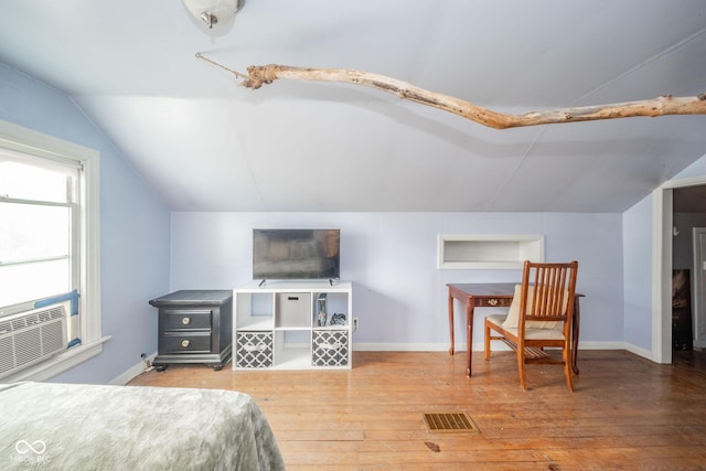3004 Sheridan St, Anderson, IN 46016 - bedroom featuring vaulted ceiling, wood-type flooring, baseboards, and cooling unit