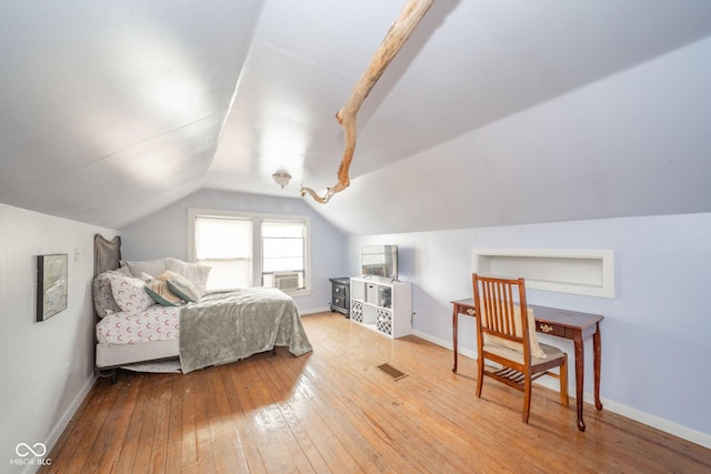 3004 Sheridan St, Anderson, IN 46016 - bedroom with hardwood / wood-style flooring, lofted ceiling, baseboards, and cooling unit