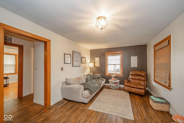 3004 Sheridan St, Anderson, IN 46016 - living area with dark wood finished floors and baseboards