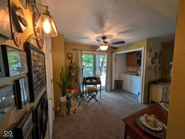 317 Washington St, Clay City, IN 47841 - living room featuring washer and dryer, carpet, a ceiling fan, and a textured ceiling