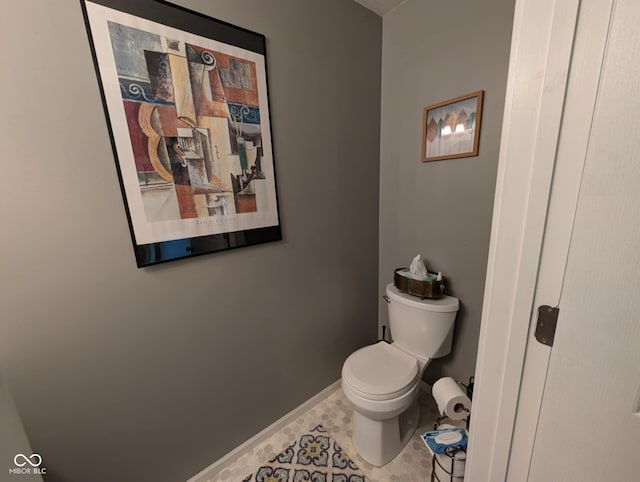 317 Washington St, Clay City, IN 47841 - bathroom with toilet, baseboards, and tile patterned floors