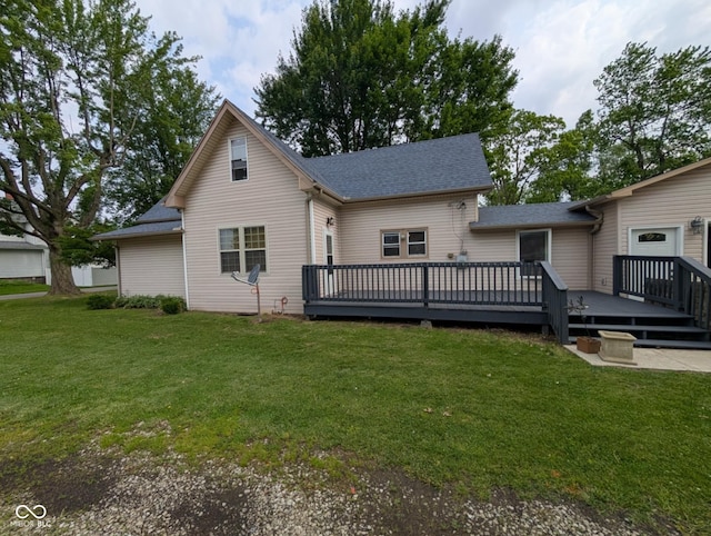 317 Washington St, Clay City, IN 47841 - rear view of property featuring a deck, a lawn, and roof with shingles