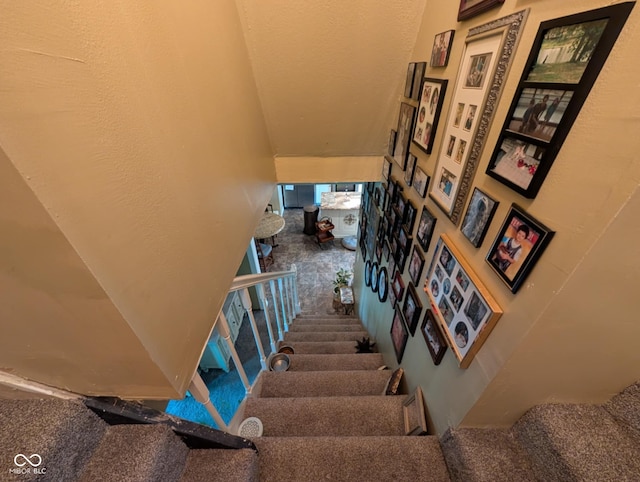 317 Washington St, Clay City, IN 47841 - stairway featuring carpet floors