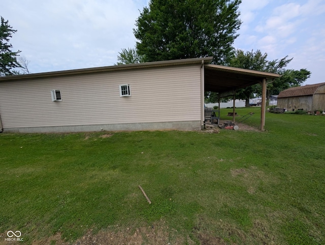 317 Washington St, Clay City, IN 47841 - view of side of home featuring a lawn