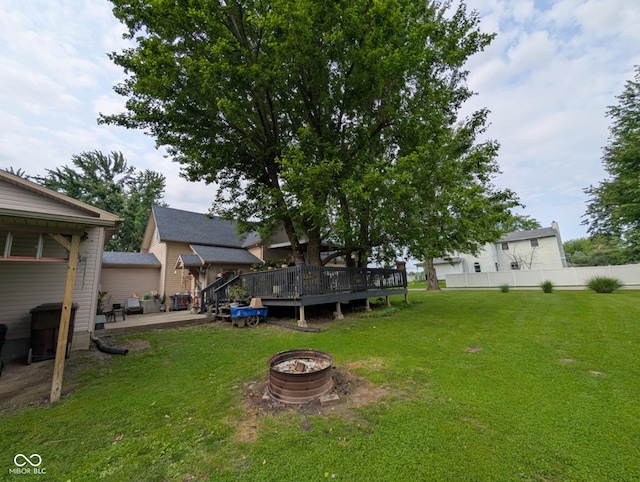 317 Washington St, Clay City, IN 47841 - view of yard featuring a wooden deck, an outdoor fire pit, and a patio