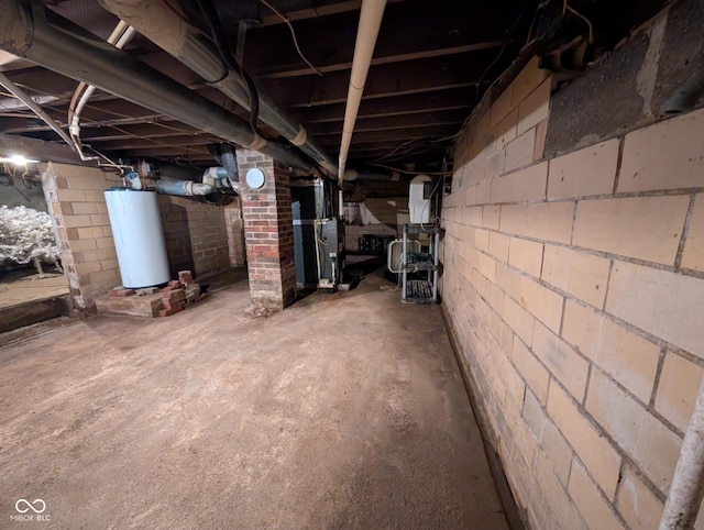 317 Washington St, Clay City, IN 47841 - unfinished below grade area featuring gas water heater and heating unit