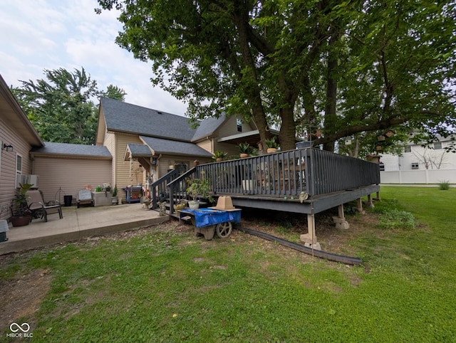 317 Washington St, Clay City, IN 47841 - back of property with a patio, a yard, and a deck