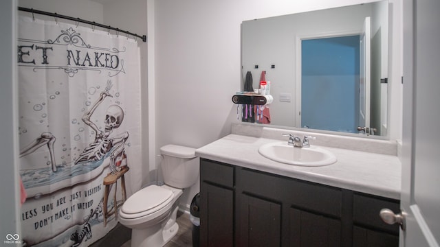 2916 W Bargello Ln, Monrovia, IN 46157 - full bathroom with vanity, toilet, wood finished floors, and curtained shower