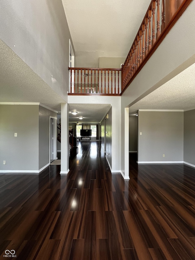 585 Fireside Dr, Greenwood, IN 46143 - foyer entrance featuring a high ceiling and wood finished floors