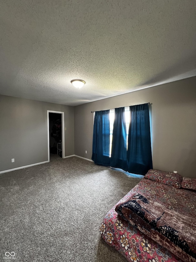 585 Fireside Dr, Greenwood, IN 46143 - bedroom featuring a textured ceiling and carpet flooring