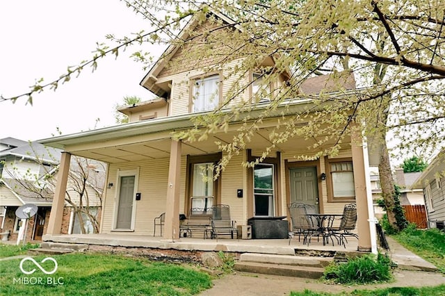 307 N Arlington Ave, Indianapolis, IN 46219 - view of front of home featuring covered porch