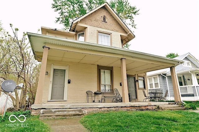 307 N Arlington Ave, Indianapolis, IN 46219 - victorian house with a porch