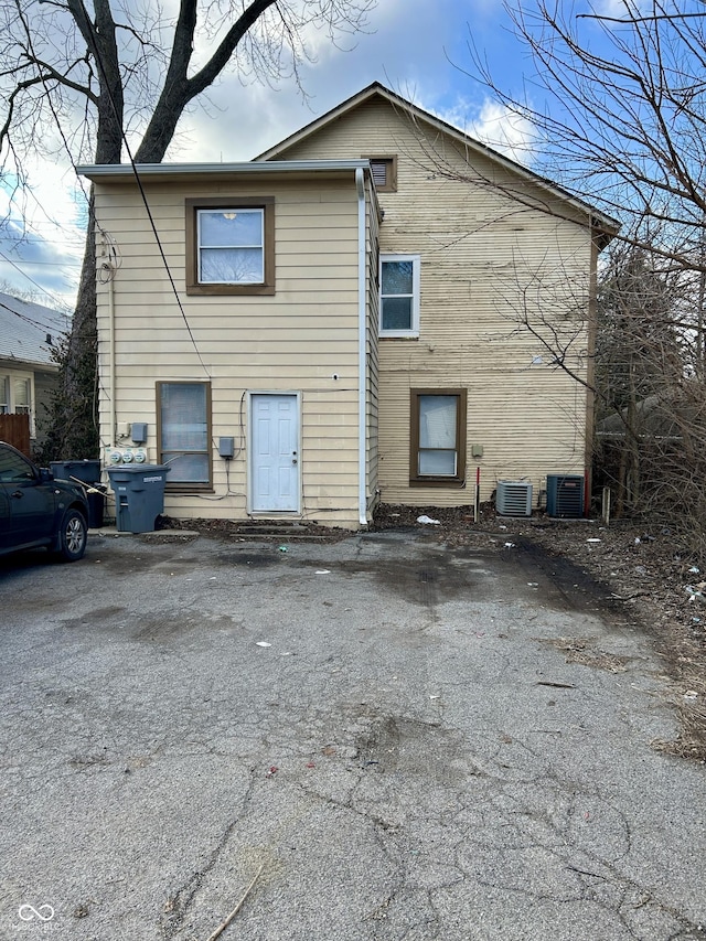 307 N Arlington Ave, Indianapolis, IN 46219 - back of property featuring central air condition unit