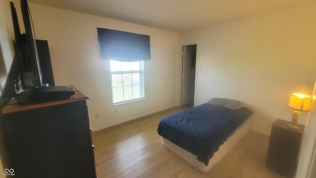 713 Driftwood Cir, Danville, IN 46122 - bedroom with wood finished floors and baseboards