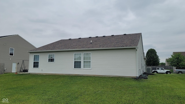 713 Driftwood Cir, Danville, IN 46122 - rear view of property featuring a shingled roof and central AC unit