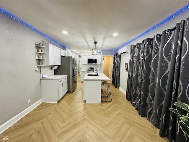 38 Hendricks Pl, Indianapolis, IN 46201 - kitchen with stainless steel appliances, light countertops, recessed lighting, white cabinets, and open shelves