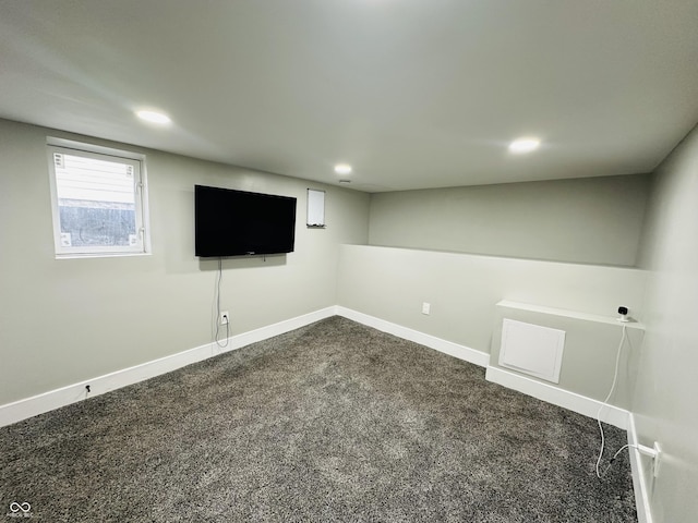 38 Hendricks Pl, Indianapolis, IN 46201 - below grade area with dark colored carpet and recessed lighting